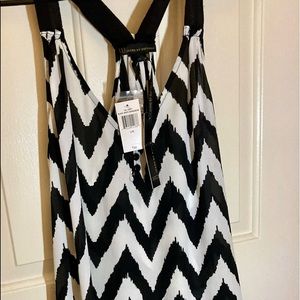 I Jeans by Buffalo. Sheer black and white zebra tank top with cute back detail.